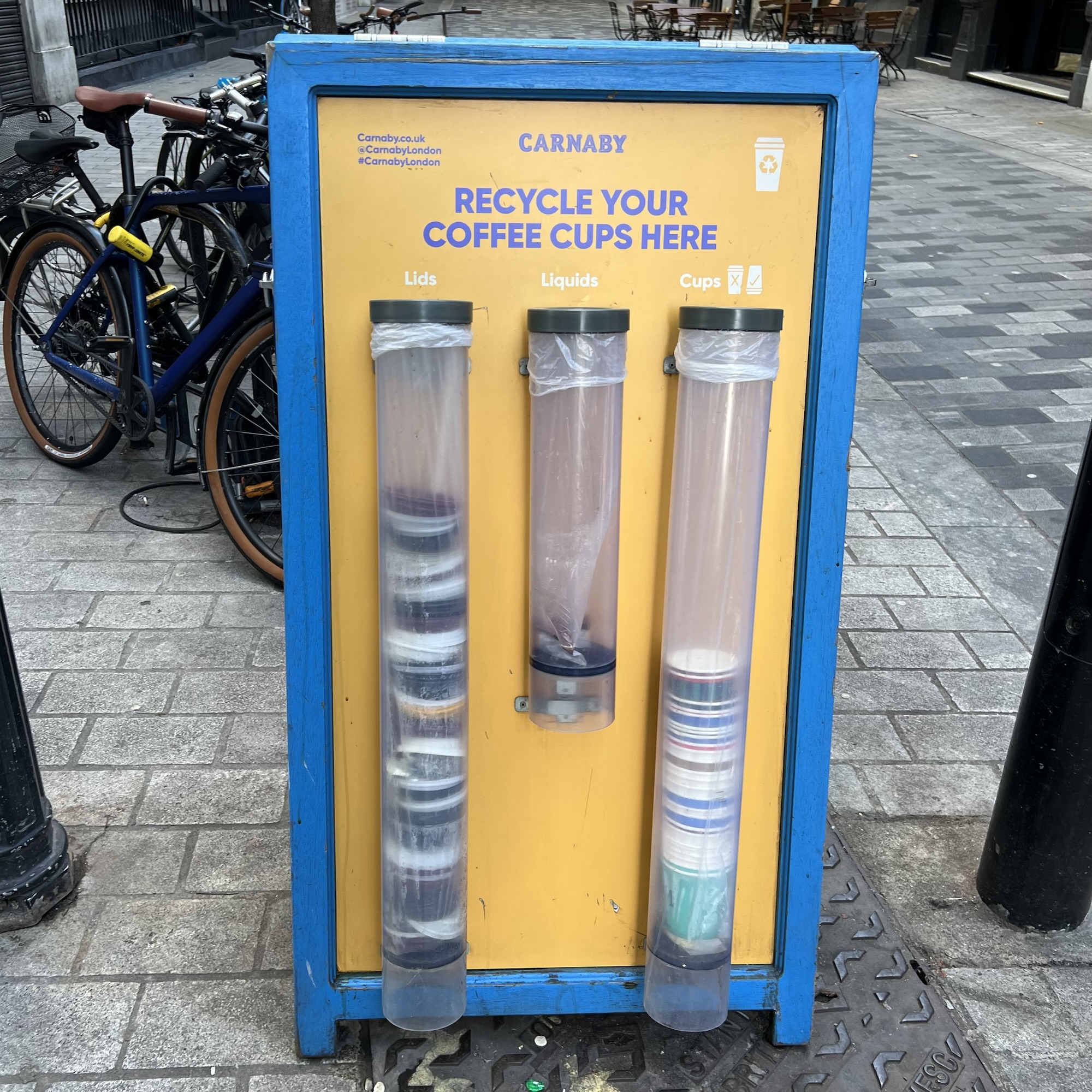 incredibly charmed by this coffee cup disposal board